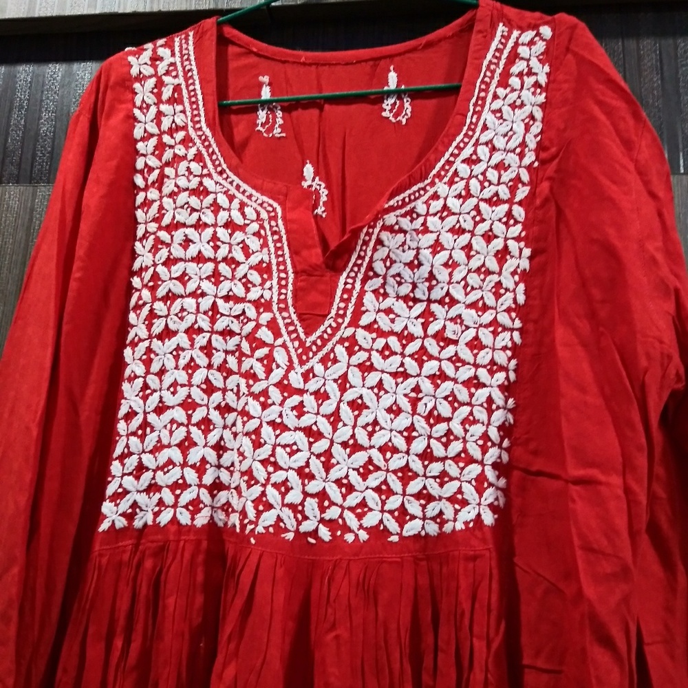 Dress with needle work desing